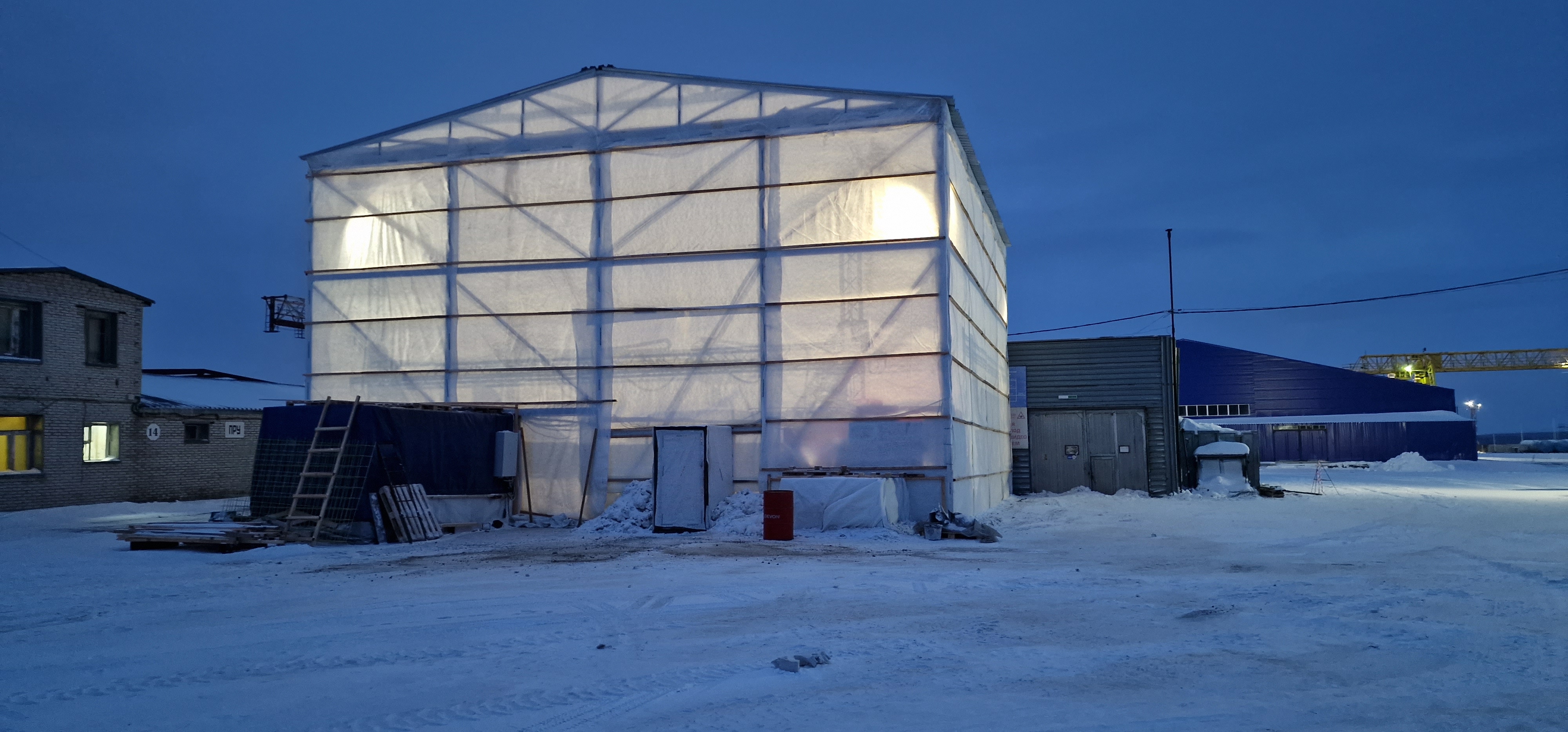 DomeGuard all-weather enclosure deployed on a snowy worksite